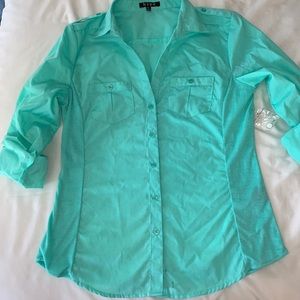 Blue-ish green button up shirt
